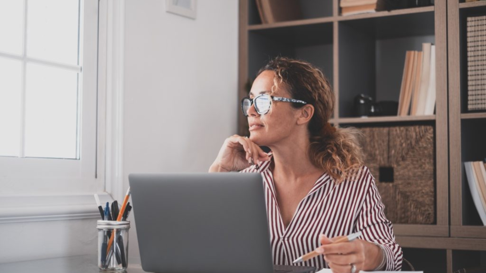 caucasian-reflexive-looking-at-laptop-screen-refl-2021-09-02-11-56-20-utc-1024x683